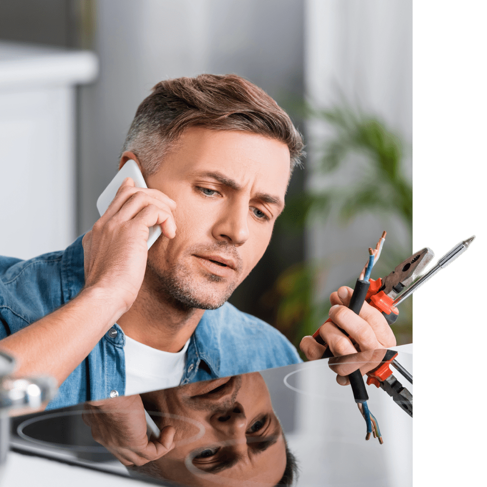 man with confused look holding tools in his hand - Appliance Solutions appliance parts