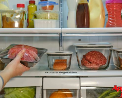 interior of fridge with fruits and vegetables - Appliance Solutions