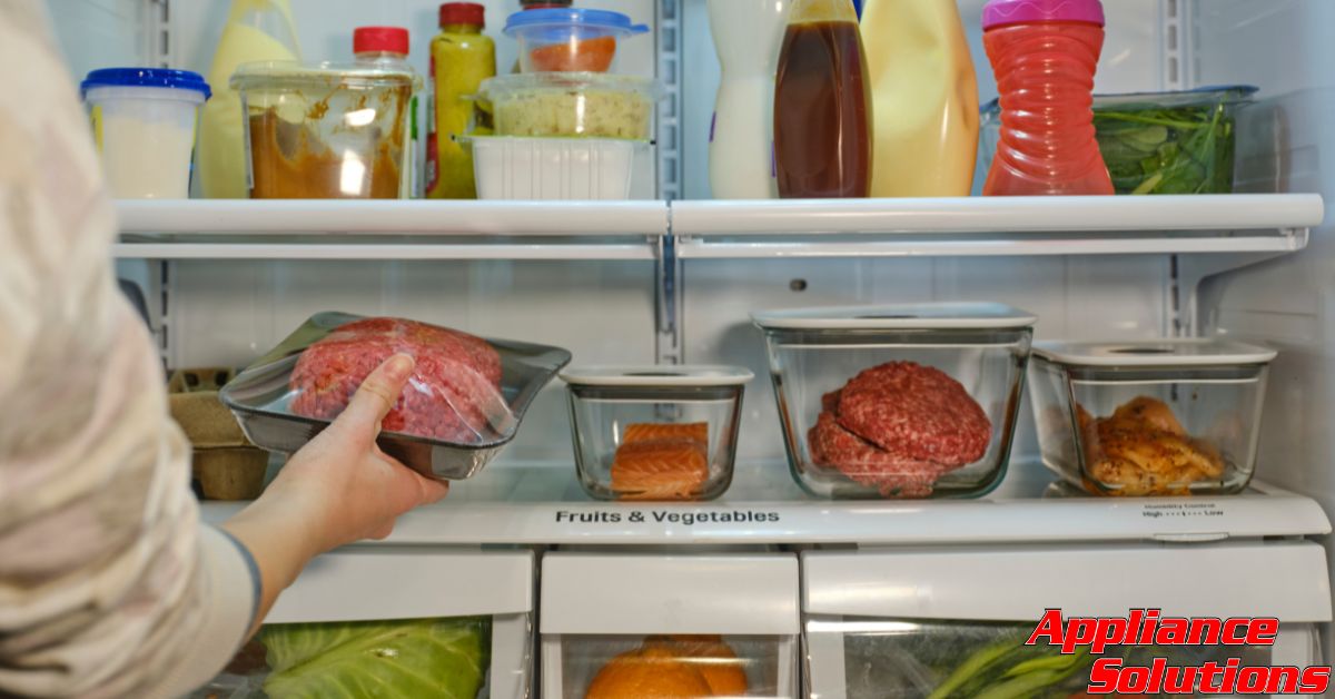 interior of fridge with fruits and vegetables - Appliance Solutions refrigerator repair